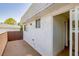 Second story balcony with stucco walls and sliding glass door at 233 Pecos Way, Las Vegas, NV 89121