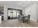 Bright dining area with a view to the backyard through sliding glass doors at 251 Castellari Dr, Las Vegas, NV 89138