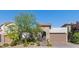 Charming single-Gathering home featuring desert landscaping and a two car garage at 251 Castellari Dr, Las Vegas, NV 89138
