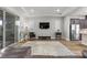 Comfortable living room with sleek wood floors, modern furniture, and a bright, airy feel at 251 Castellari Dr, Las Vegas, NV 89138