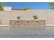 Relaxing in-ground pool features a stunning mosaic waterfall design creating a tranquil backyard oasis at 251 Castellari Dr, Las Vegas, NV 89138