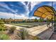 Well-maintained bocce ball courts with shaded seating areas at 2535 Leighton Ave, Henderson, NV 89052