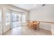 Bright dining area featuring a sliding glass door providing access to the backyard and natural light at 2535 Leighton Ave, Henderson, NV 89052