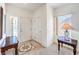 Bright entryway features tile flooring, a decorative medallion, and ample natural light from a large window at 2535 Leighton Ave, Henderson, NV 89052