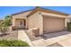 Attractive single-story home with a two-car garage, desert landscaping, and a covered front entry at 2535 Leighton Ave, Henderson, NV 89052