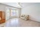Inviting living space featuring a bay window offering plenty of natural light and neutral decor at 2535 Leighton Ave, Henderson, NV 89052