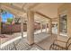 Covered patio offering shade and space for relaxation, overlooking the low-maintenance backyard at 2535 Leighton Ave, Henderson, NV 89052