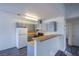 Efficient kitchen featuring gray cabinets, wood countertops, and modern appliances for a delightful cooking experience at 2696 Jennydiane Dr, Las Vegas, NV 89121