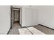 The bright bedroom with new carpet features a sliding door closet at 2963 Juniper Hills Blvd # 104, Las Vegas, NV 89142