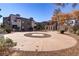 Attractive condo community featuring desert landscaping and multiple residential buildings at 2963 Juniper Hills Blvd # 104, Las Vegas, NV 89142