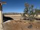 View of desert landscape with mountain views off the back of the house at 3090 N Woodchips Rd, Pahrump, NV 89060