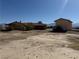 Single story home featuring desert landscaping at 3090 N Woodchips Rd, Pahrump, NV 89060