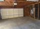 Spacious two car garage featuring an automatic door and concrete flooring ready for customization at 3090 N Woodchips Rd, Pahrump, NV 89060
