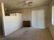 Spacious Living Room featuring natural lighting, carpet flooring and sliding glass doors to an outdoor space at 3090 N Woodchips Rd, Pahrump, NV 89060