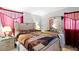 Cozy bedroom with tiger themed beddings at 3212 Osage Ave, Las Vegas, NV 89101