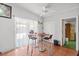 Simple dining area with overhead light and sliding door at 3212 Osage Ave, Las Vegas, NV 89101