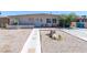 Charming single-story home featuring desert landscaping, a tidy yard, and a classic facade at 3212 Osage Ave, Las Vegas, NV 89101