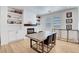 Stylish dining room with built-in shelves and a modern table setting at 3310 Hillside Garden Dr, Las Vegas, NV 89135