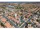 Residential community featuring single-Gathering homes with terracotta roofs and mature landscaping from above at 3632 Julia Waldene Ct, Las Vegas, NV 89129