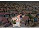 Aerial view featuring a home with a terracotta roof and solar panels in a residential neighborhood at 3632 Julia Waldene Ct, Las Vegas, NV 89129
