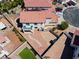 Aerial view of the fenced backyard, patio, and an artificial lawn at 3632 Julia Waldene Ct, Las Vegas, NV 89129