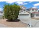 Charming two-story home featuring a well-maintained front yard and a two-car garage at 3632 Julia Waldene Ct, Las Vegas, NV 89129