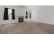 Spacious living room featuring a cozy fireplace and bright windows at 3632 Julia Waldene Ct, Las Vegas, NV 89129