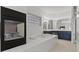 Main bathroom with black fireplace, tiled tub and dual vanity at 3632 Julia Waldene Ct, Las Vegas, NV 89129