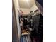 Walk-in closet with hanging clothes, shelving, and shoes at 4238 Rollingstone Dr, Las Vegas, NV 89103