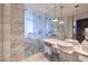 Luxurious bathroom with modern fixtures and a glass-enclosed shower with premium tile at 4381 W Flamingo Rd # 1905, Las Vegas, NV 89103