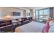 Bright, modern bedroom showcasing a desk, a bed, city views, and an entertainment area at 4381 W Flamingo Rd # 1905, Las Vegas, NV 89103