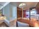Open concept kitchen with stainless steel appliances, dining space, and contemporary lighting at 4381 W Flamingo Rd # 1905, Las Vegas, NV 89103