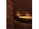 Spa room with a custom-designed tiled wall, recessed seating, and ambient lighting for a relaxing experience at 4381 W Flamingo Rd # 1905, Las Vegas, NV 89103