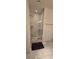 Modern bath includes a glass-enclosed shower with marble tile at 4471 Dean Martin Dr # 1104, Las Vegas, NV 89103