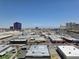 Expansive city view of various structures, including commercial buildings and roadways at 4471 Dean Martin Dr # 1104, Las Vegas, NV 89103