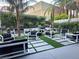 Outdoor courtyard featuring elegant seating arrangements and lush greenery at 4471 Dean Martin Dr # 1104, Las Vegas, NV 89103