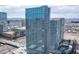 Exterior of a modern high-rise residential building with striking architecture and design at 4471 Dean Martin Dr # 1104, Las Vegas, NV 89103