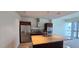 Modern kitchen with stainless steel appliances and granite countertops provides an open design for entertaining at 4471 Dean Martin Dr # 1104, Las Vegas, NV 89103