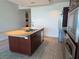 Well-equipped kitchen with stainless steel appliances, granite island, and adjacent laundry area for added convenience at 4471 Dean Martin Dr # 1104, Las Vegas, NV 89103
