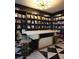 A well-appointed in-home library with extensive shelving and unique decor at 4471 Dean Martin Dr # 1104, Las Vegas, NV 89103