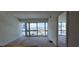A bright, open living room space with floor-to-ceiling windows offering panoramic views at 4471 Dean Martin Dr # 1104, Las Vegas, NV 89103