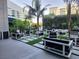 Sophisticated outdoor lounge with modern furniture, beautiful greenery, and a tranquil atmosphere for residents at 4471 Dean Martin Dr # 1104, Las Vegas, NV 89103