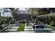 Outdoor patio space with cozy seating areas, landscaping, and a fire pit at 4471 Dean Martin Dr # 1104, Las Vegas, NV 89103