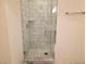 Contemporary shower featuring marble tiling, glass door and sleek chrome fixtures at 4471 Dean Martin Dr # 1104, Las Vegas, NV 89103