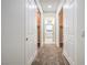 Hallway with closets on either side leading to the bathroom at 4664 Stuttgart St, Las Vegas, NV 89147