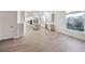 Bright kitchen featuring white cabinetry and a center island cooktop at 4664 Stuttgart St, Las Vegas, NV 89147
