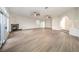 Spacious living room boasts wood floors, fireplace, and natural light at 4664 Stuttgart St, Las Vegas, NV 89147