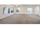 Expansive living room featuring large windows for ample natural light at 4664 Stuttgart St, Las Vegas, NV 89147
