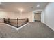 Open loft area featuring a decorative chandelier and railing at 4664 Stuttgart St, Las Vegas, NV 89147