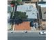 Aerial shot of house including front yard with desert landscaping, driveway, cars, and in-ground pool at 5178 Wilbur St, Las Vegas, NV 89119